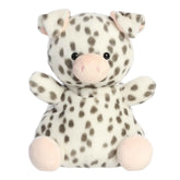 Larger plush toy of a white piglet in the Palm Pals collection, covered in black spots